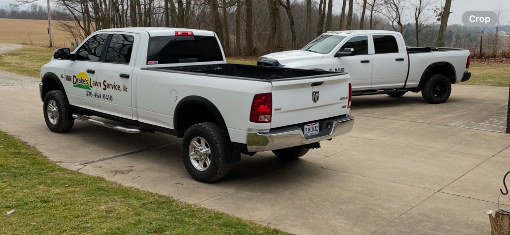 Drake's Lawn Service work trucks.